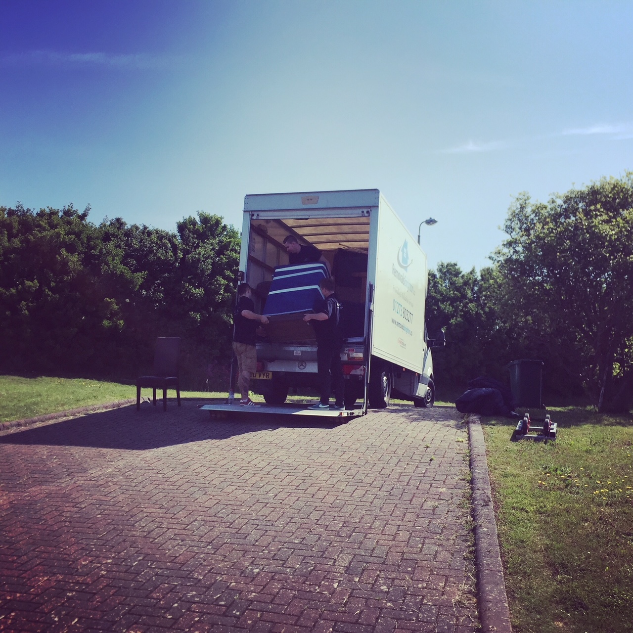 Removals Brighton team loading furniture into van