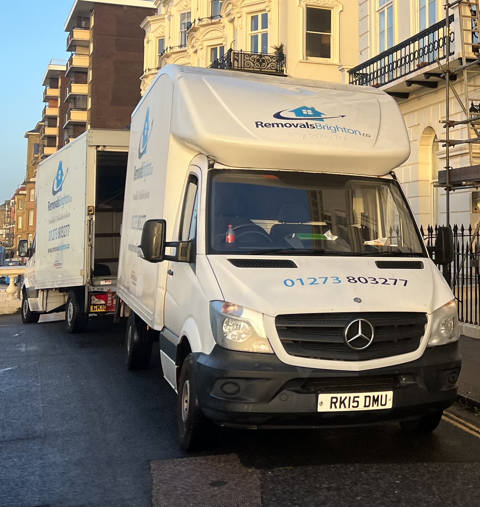 Removals Brighton van on the seafront at golden hour